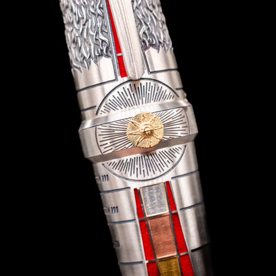 A detail view of the middle ring with the sun facing the camera on the Montegrappa Alchemist Ignis Fountain Pen.