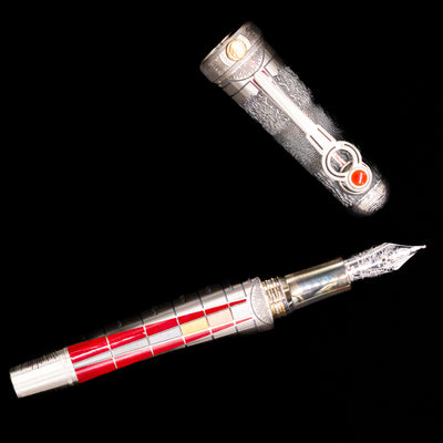 An overhead view of the Montegrappa Alchemist Ignis Fountain Pen uncapped.