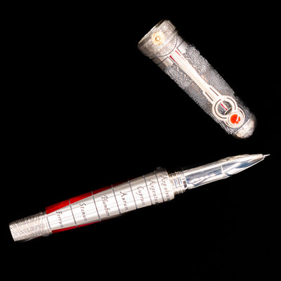 An overhead view of the Montegrappa Alchemist Ignis Rollerbal Pen uncapped.