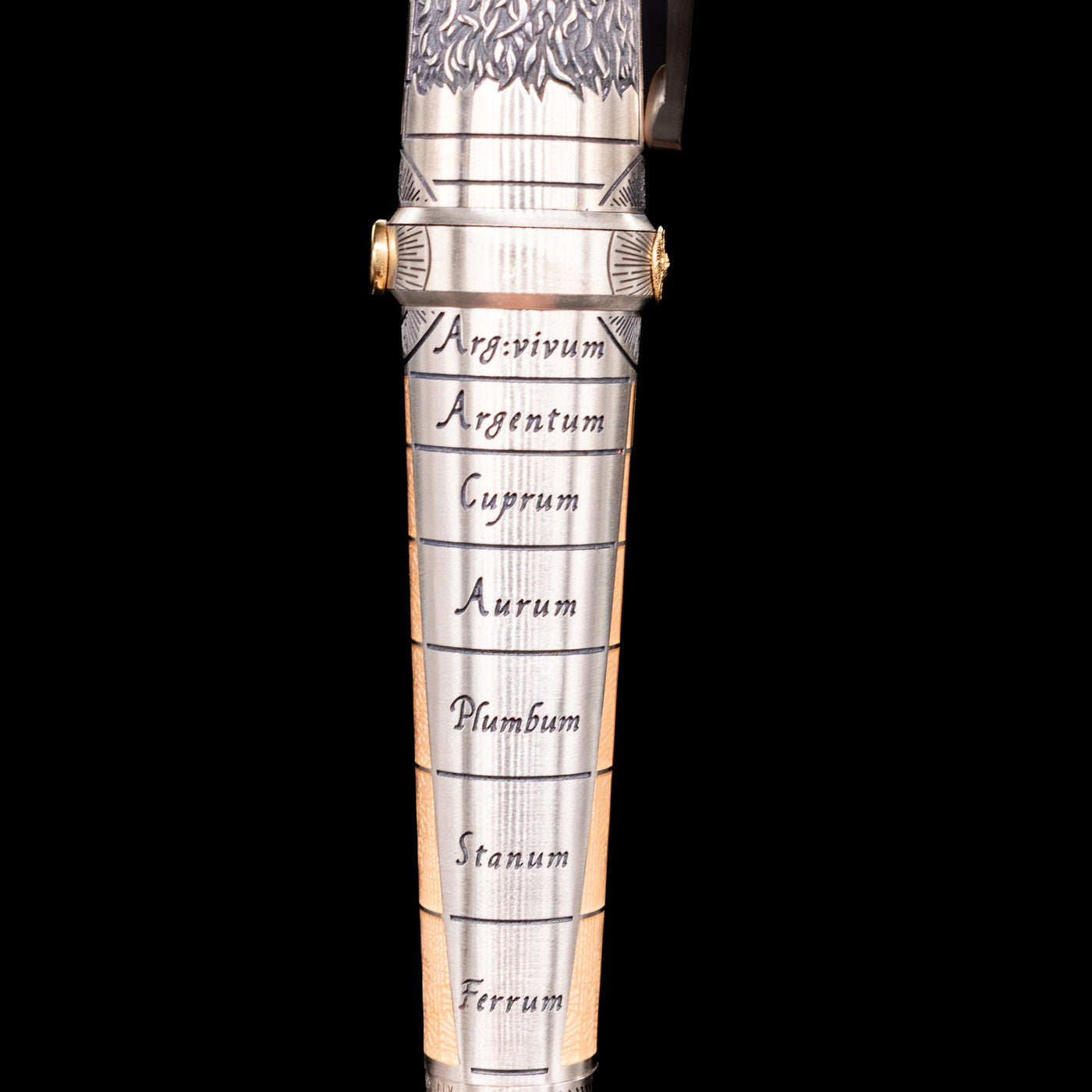 A detail shot of the alchemic words of the Montegrappa Alchemist Terra Rollerball Pen.