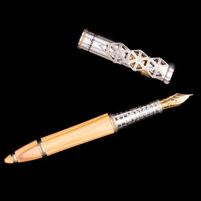 An overhead view of the Montegrappa Leonardo da Vinci 500th Anniversary Fountain Pen uncapped. 