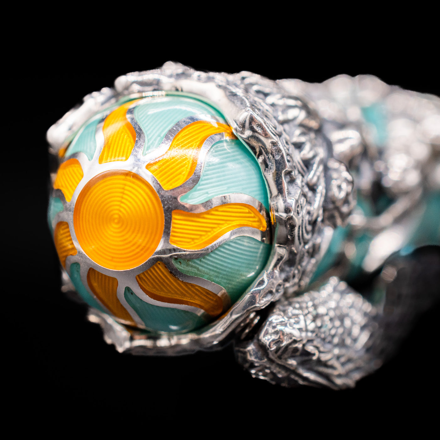 Zoomed-in view of the top of the cap with the finial on the Montegrappa My Guardian Angel Fountain Pen.