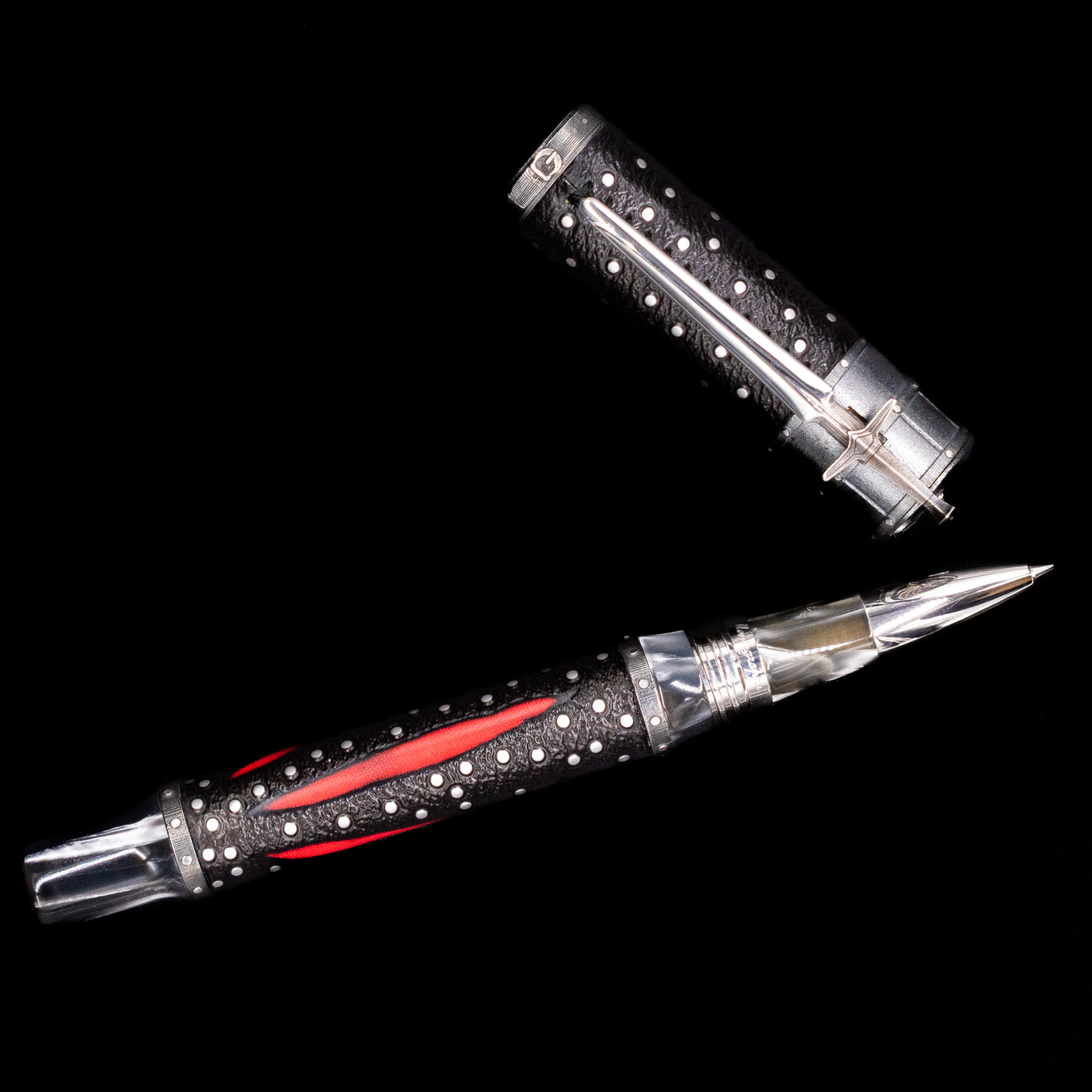 An overhead view of the Montegrappa The Witcher: Mutation Rollerbal Pen uncapped.