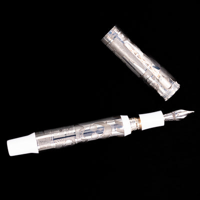 An overhead view of the Montegrappa Warner Brothers 100th Anniversary Fountain Pen uncapped.