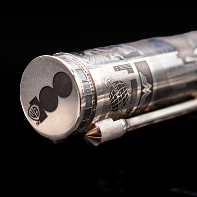 Zoomed-in view of the top of the cap with the finial on the Montegrappa Warner Brothers 100th Anniversary Rollerball Pen.