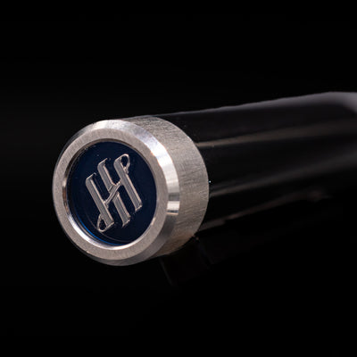 Zoomed-in view of the top of the cap with the finial on the Montegrappa Zero Black & Palladium Fountain Pen - Preowned.