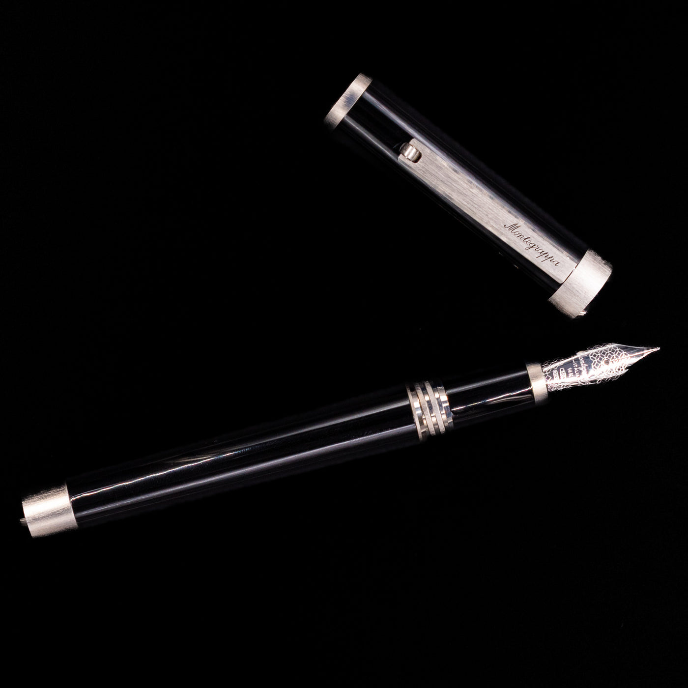An overhead view of the Montegrappa Zero Black & Palladium Fountain Pen - Preowned uncapped.