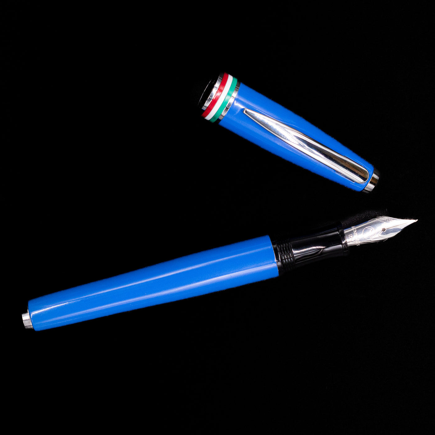 An overhead view of the Monteverde Aldo Domani Italia Fountain Pen - Exotic Blue uncapped.