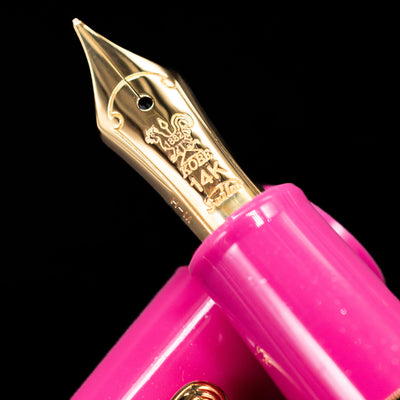 A macro shot of the nib with its intricate detailing and logo engraving for the Nagasawa Original Fountain Pen - Suma-Rikyu Rose.