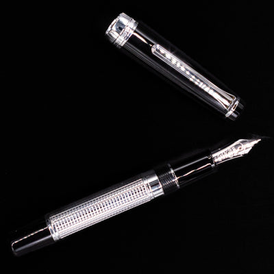 An overhead view of the Nagasawa Original Limited Edition Fountain Pen - Engrave Kou uncapped.