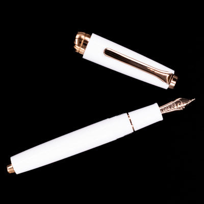 An overhead view of the Nagasawa Original Limited Edition Fountain Pen - Odyssey Snow White uncapped.