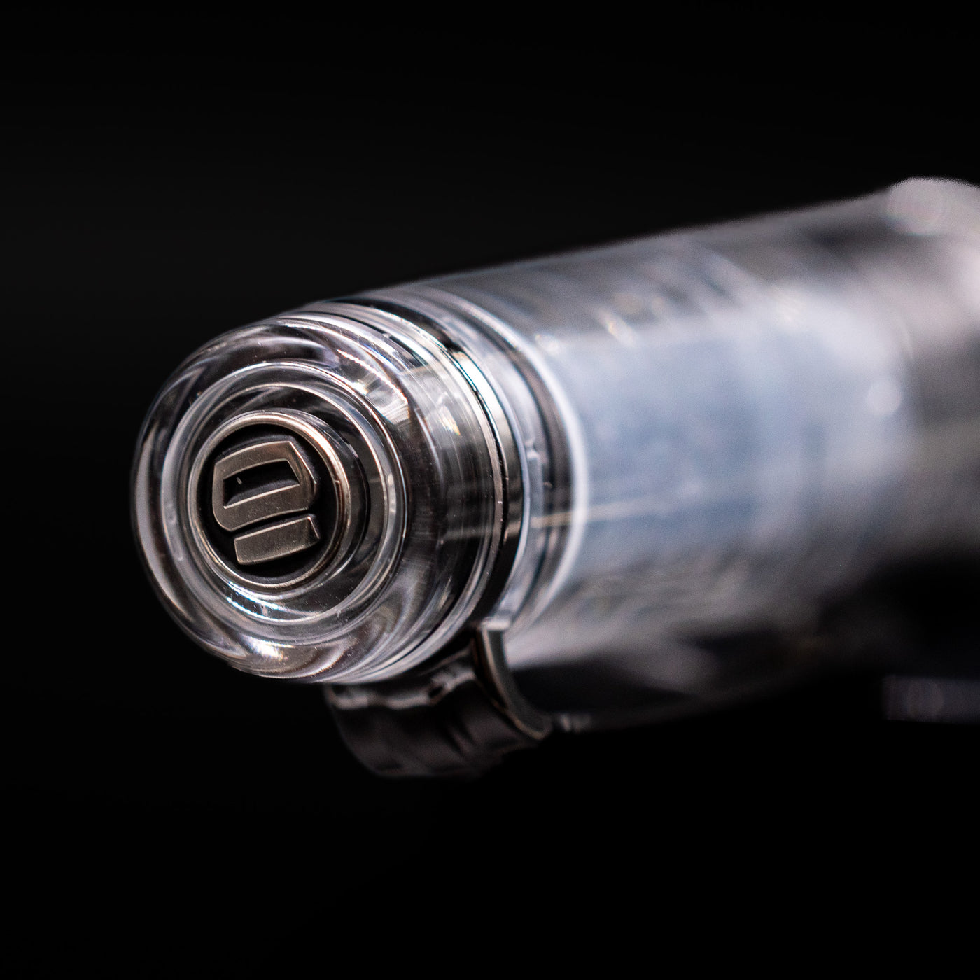  Zoomed-in view of the top of the cap with the finial on the Nagasawa Original Professional Gear Fountain Pen - Skeleton Black.