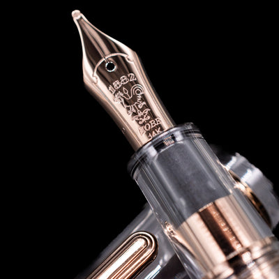 A macro shot of the nib with its intricate detailing and logo engraving for the Nagasawa Original Standard Fountain Pen - Skeleton Proske Antique Gold.