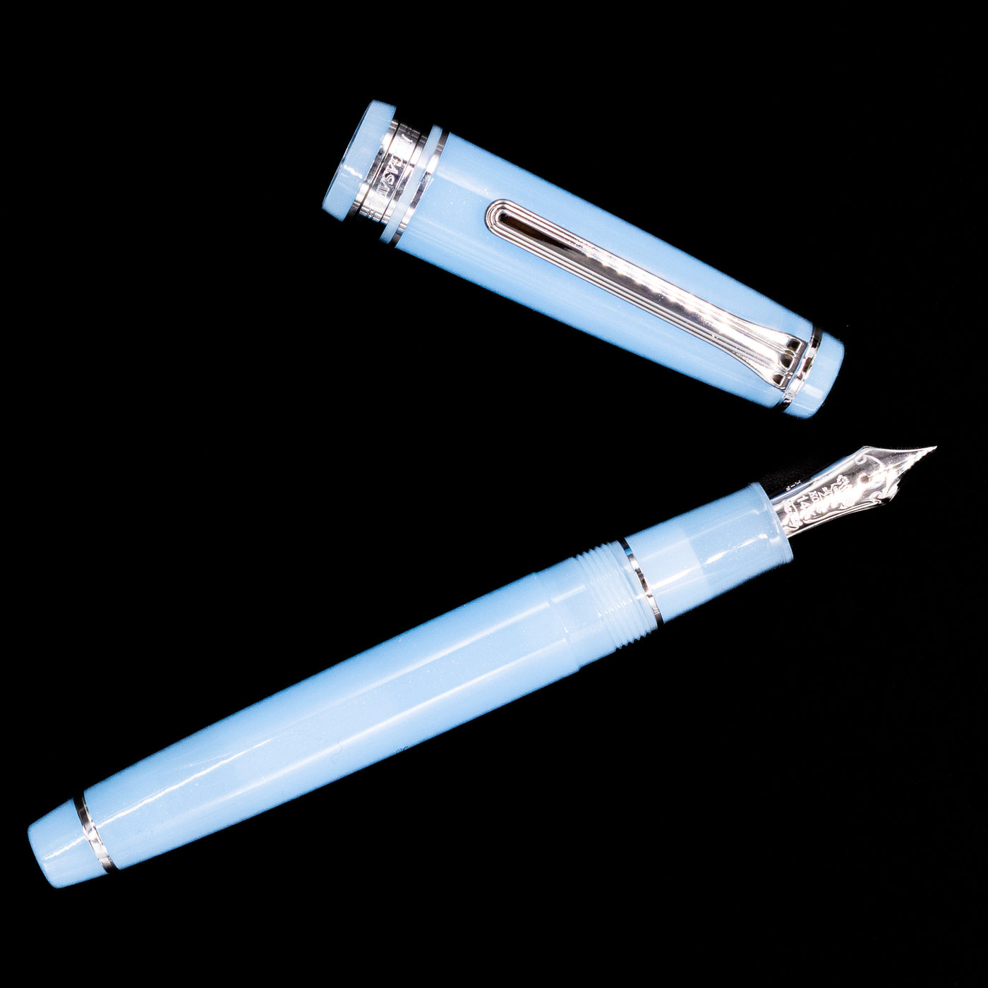 An overhead view of the Nagasawa Original Standard Onomatopoeia Fountain Pen - Puka Puka uncapped.