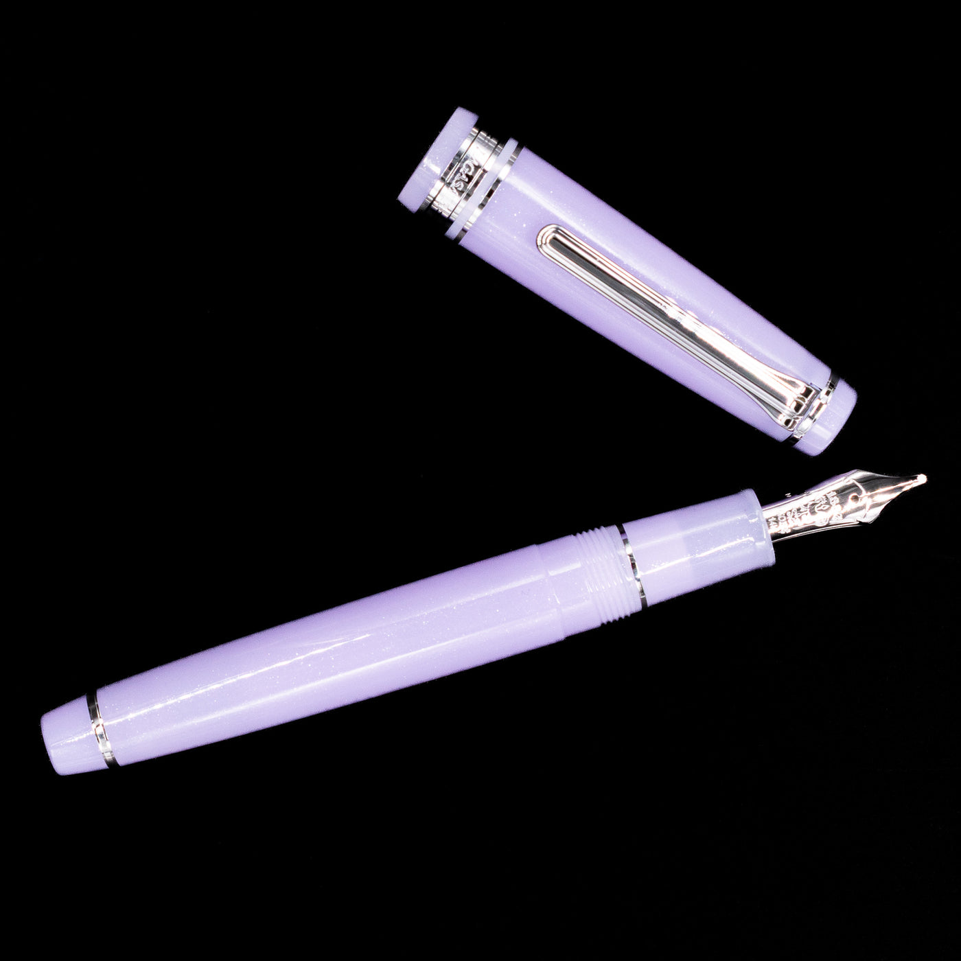 An overhead view of the Nagasawa Original Standard Onomatopoeia Fountain Pen - Yura Yura uncapped.