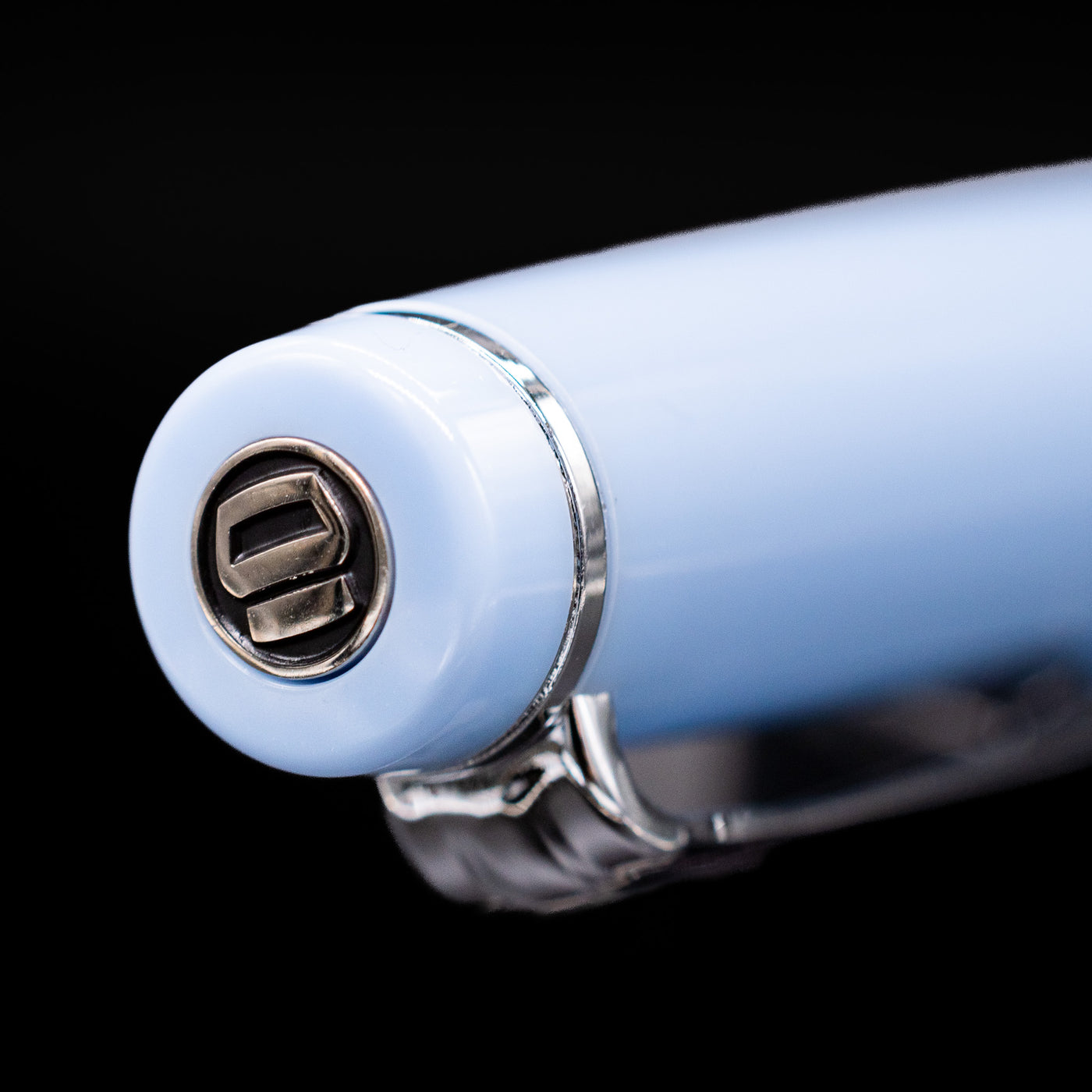 Zoomed-in view of the top of the cap with the finial on the Nagasawa Original Standard Rokko Fountain Pen - Island Sky.