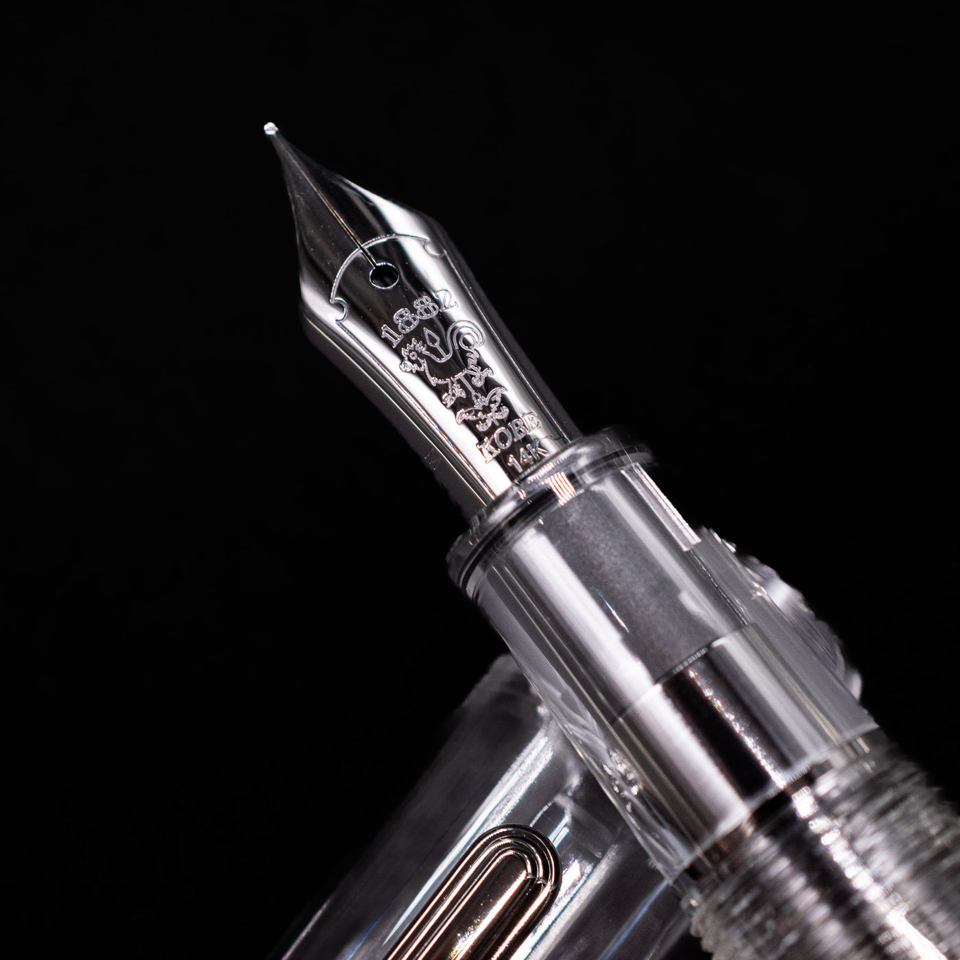 A macro shot of the nib with its intricate detailing and logo engraving for the Nagasawa Original Standard Fountain Pen - Skeleton Proske Black.