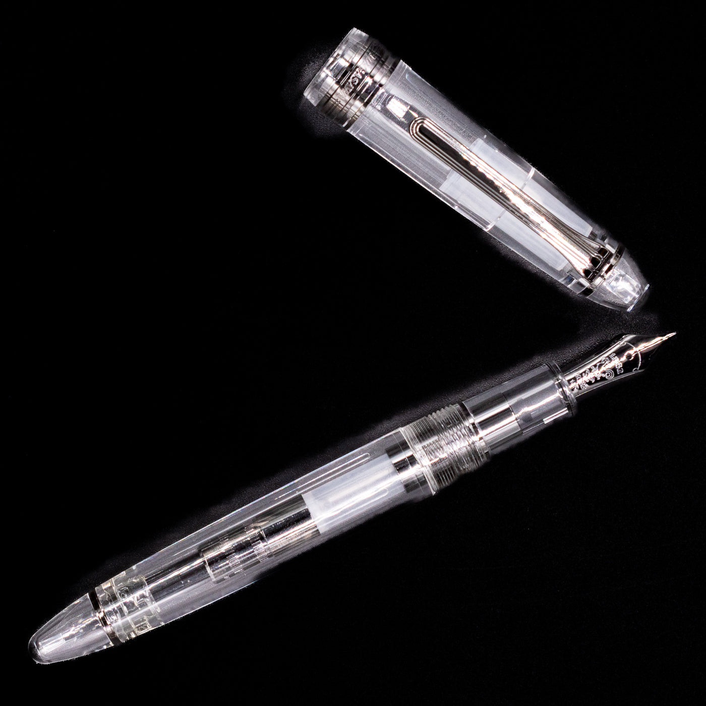 An overhead view of the Nagasawa Original Standard Fountain Pen - Skeleton Proske Black uncapped.