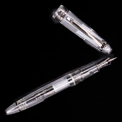 An overhead view of the Nagasawa Original Standard Fountain Pen - Skeleton Proske Black uncapped.