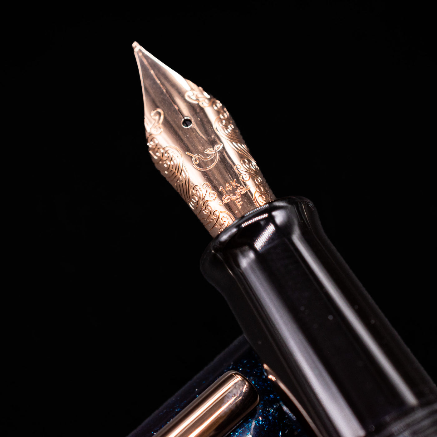 A macro shot of the nib with its intricate detailing and logo engraving for the Nahvalur Ikkaku Urushi Fountain Pen - Blue Moon.