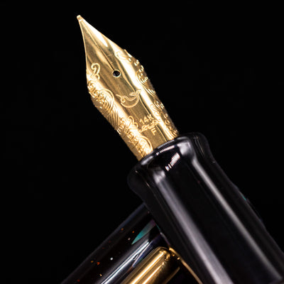 A macro shot of the nib with its intricate detailing and logo engraving for the Nahvalur Ikkaku Urushi Fountain Pen - Ye Yu.