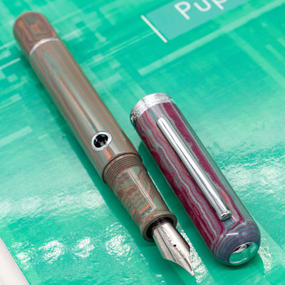 Nahvalur Rhapsody fountain pen with swirling resin body and polished steel nib – luxury pen with cartridge/converter filling system
