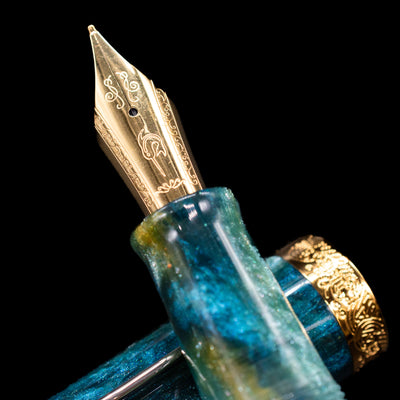 A macro shot of the nib with its intricate detailing and logo engraving for the Nahvalur Voyage Fountain Pen - Hawaii.