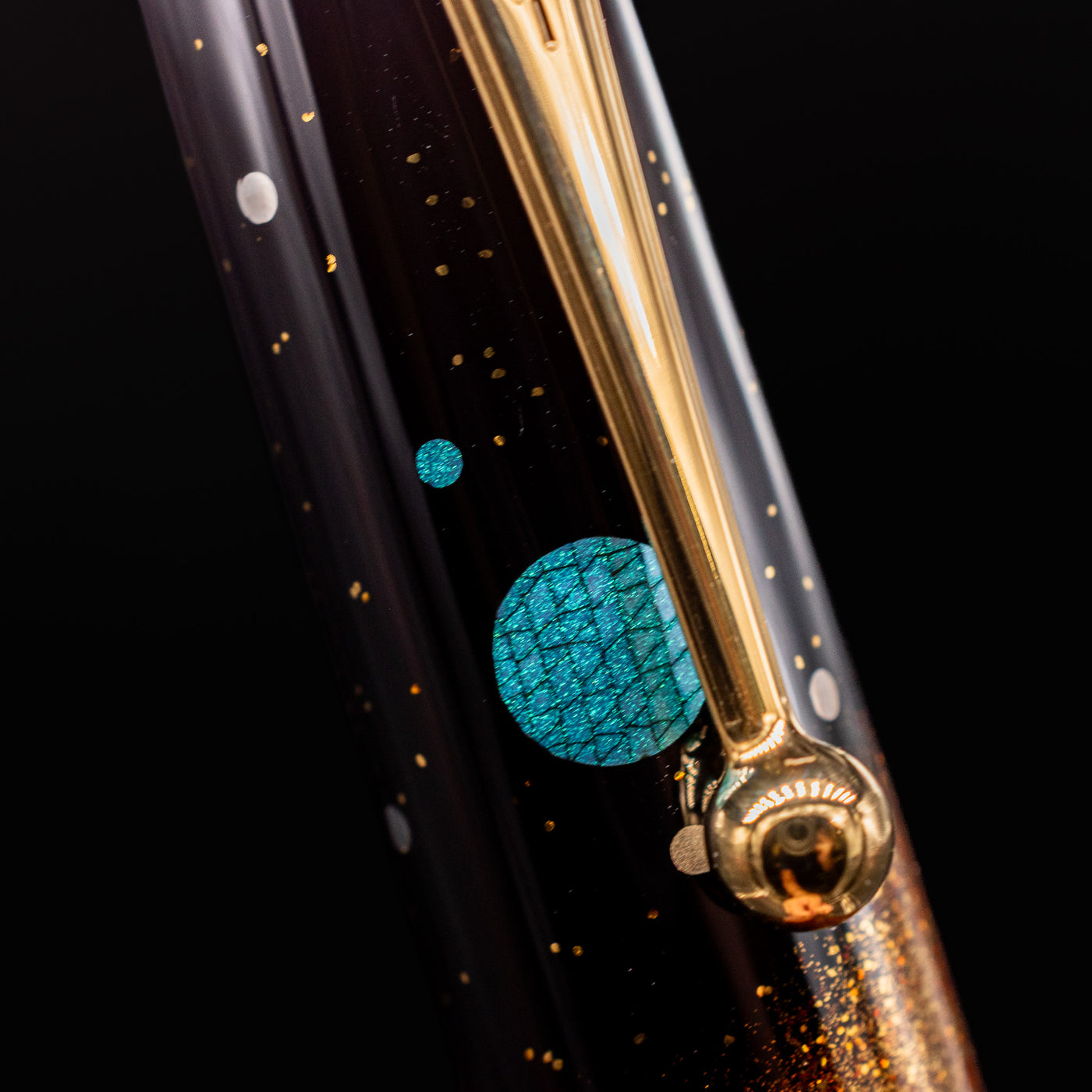 Macro shot of lacquer texture and maki-e artistry – Emphasizing layered depth and artisanal detailing that defines this luxury pen.