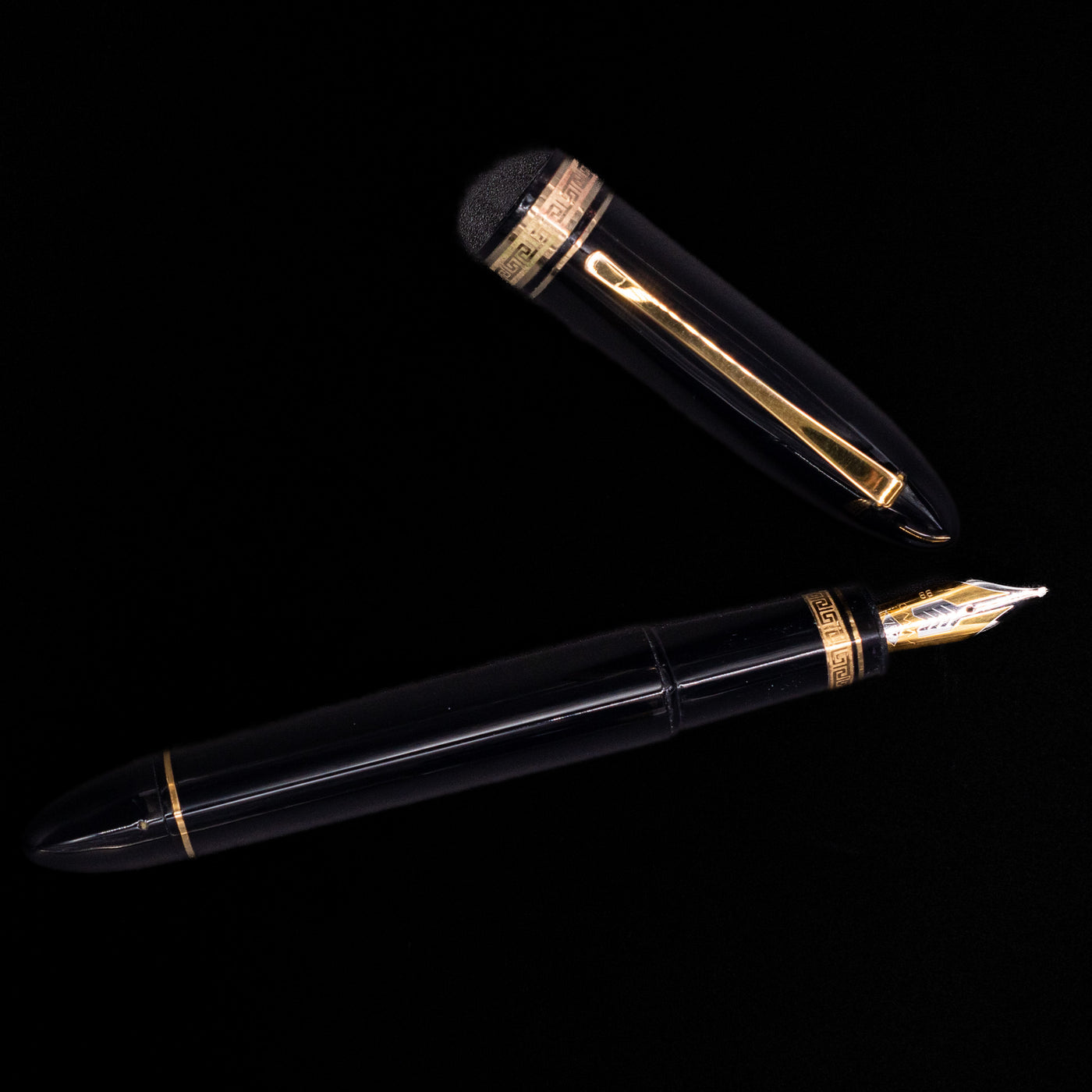 An overhead view of the OMAS 360 Dark Blue Fountain Pen - Preowned uncapped.