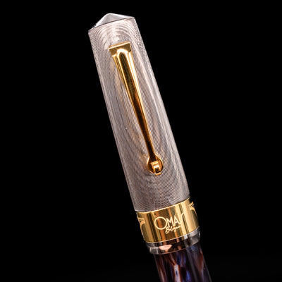 Close-up view of the cap on the OMAS Bologna Fountain Pen - Galassia Argento.