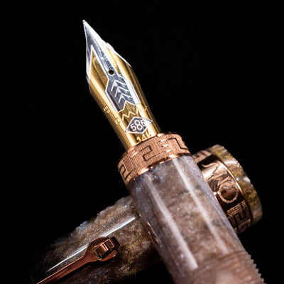 A macro shot of the nib with its intricate detailing and logo engraving for the OMAS Ogiva Cocktail Series Fountain Pen - Espresso Martini.