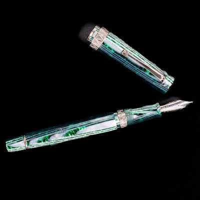 An overhead view of the OMAS Paragon Fountain Pen - Arco Verde uncapped.