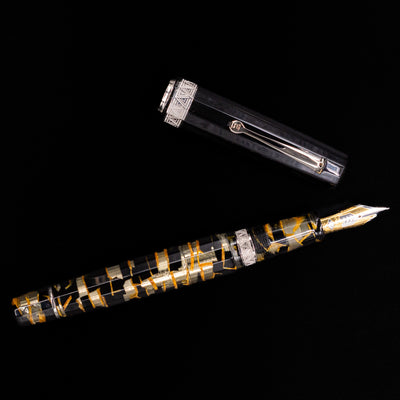 An overhead view of the OMAS Paragon Fountain Pen - Black Lucen uncapped.