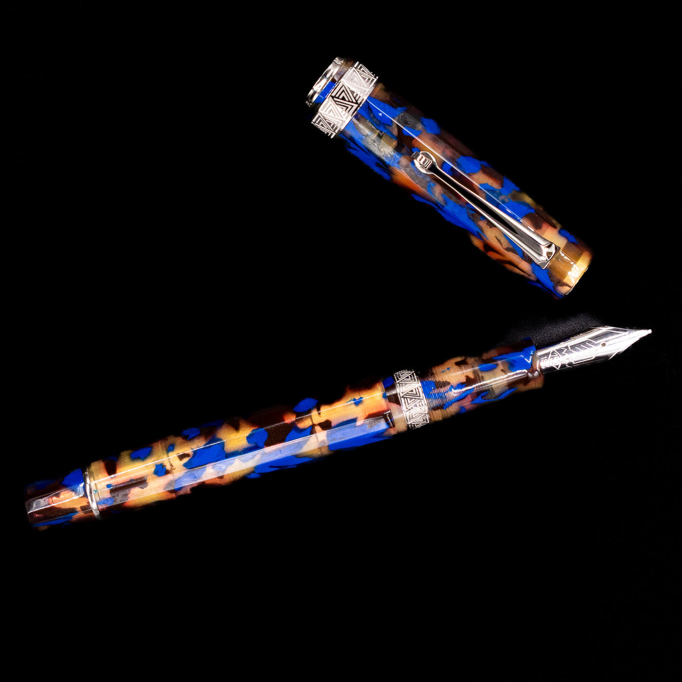 An overhead view of the OMAS Paragon Fountain Pen - Blue Lucen uncapped.