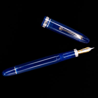 An overhead view of the Omas Ogiva Fountain Pen - Blue Silver uncapped.