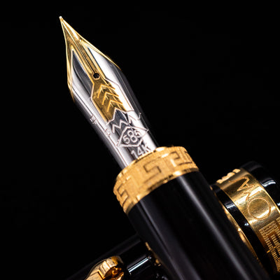 A macro shot of the nib with its intricate detailing and logo engraving for the Omas Ogiva Fountain Pen - Nera Gold.