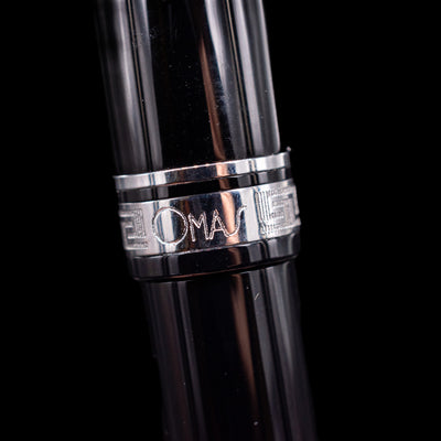 A macro shot of the center band with the logo on the Omas Ogiva Fountain Pen - Nera Silver.