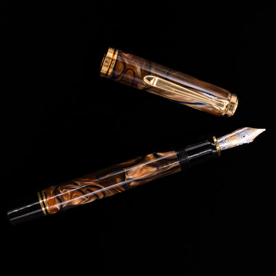 An overhead view of the Pelikan Souveran M800 Fountain Pen - Grand Place uncapped. 