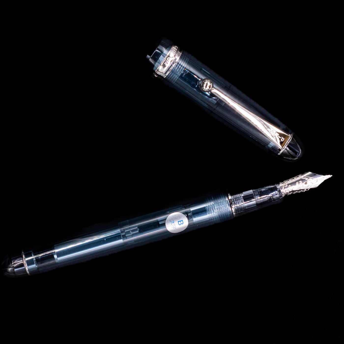An overhead view of the Pilot Custom 74 Fountain Pen - Blue Stone uncapped.