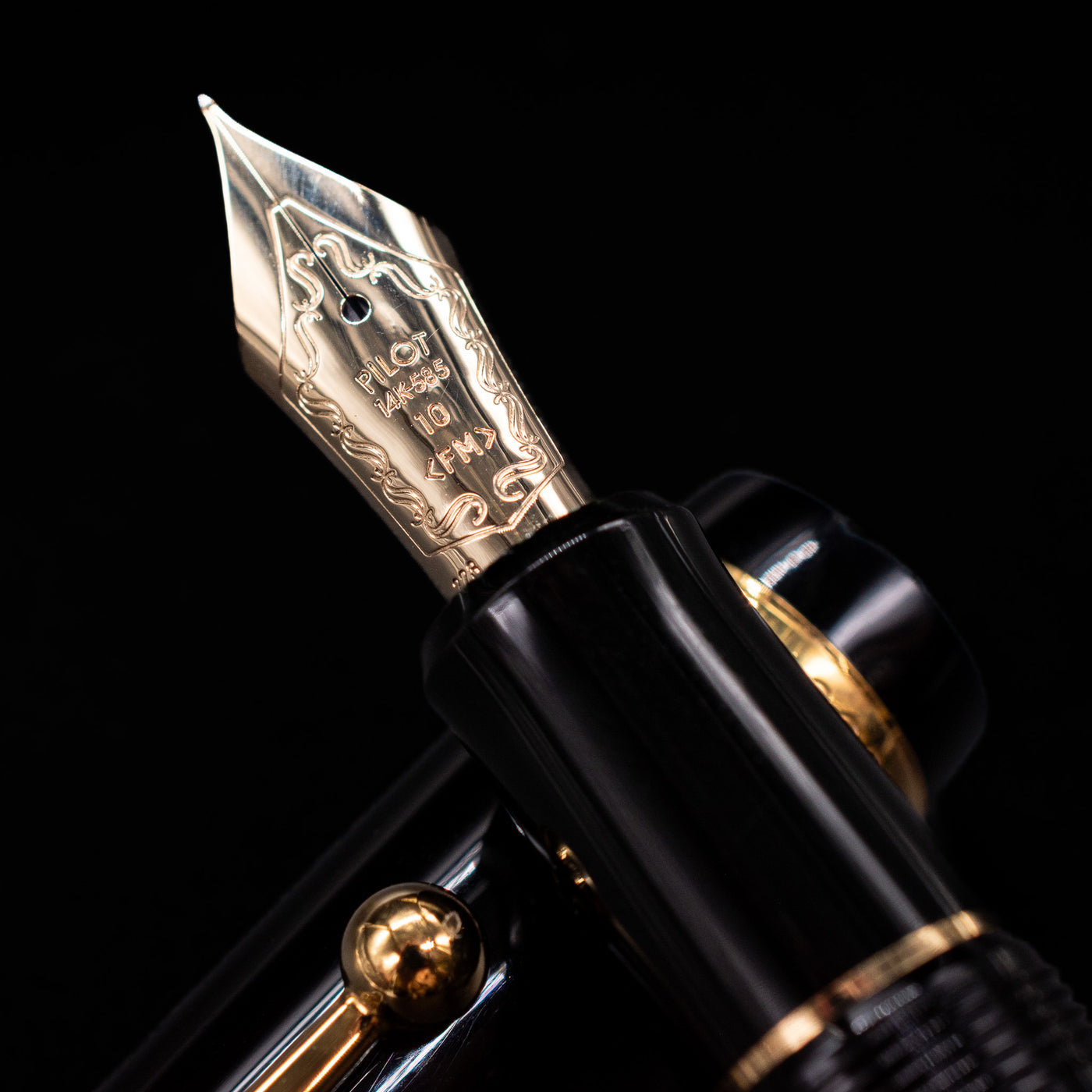 A macro shot of the nib with its intricate detailing and logo engraving for the Pilot Custom 742 Black Fountain Pen - Preowned.