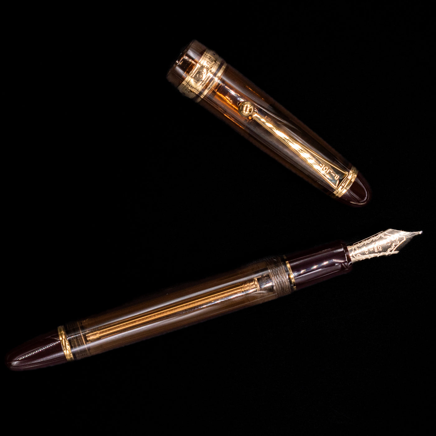 An overhead view of the Pilot Custom 823 Amber Fountain Pen uncapped.
