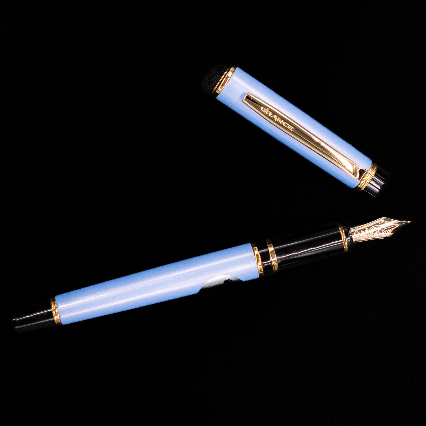 An overhead shot of the Pilot Grance Fountain Pen - Light Blue uncapped.