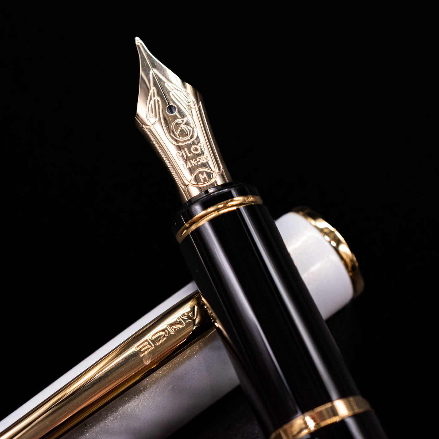 A macro shot of the nib with its intricate detailing and logo engraving for the Pilot Grance Fountain Pen - Pearl White.