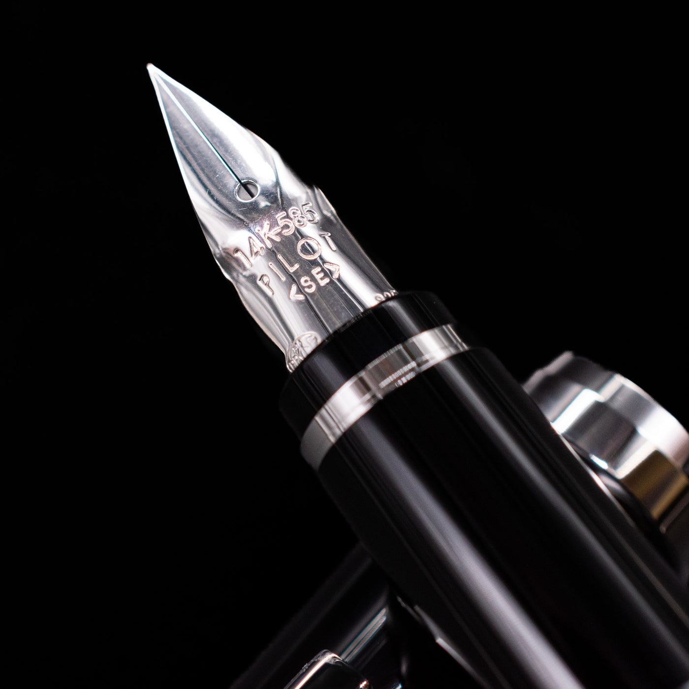 A macro shot of the nib with its intricate detailing and logo engraving for the Pilot Metal Falcon Fountain Pen - Black.