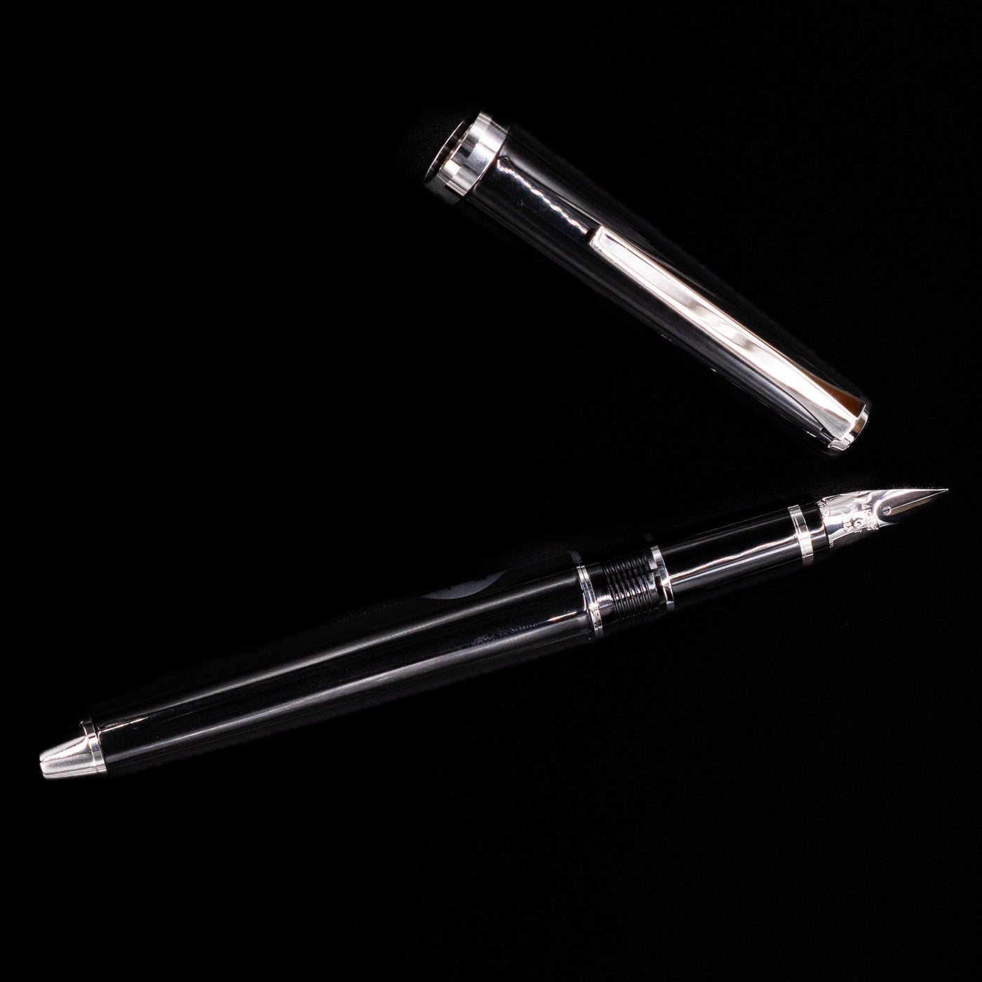 An overhead view of the Pilot Metal Falcon Fountain Pen - Black uncapped.