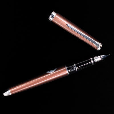 An overhead view of the Pilot Metal Falcon Fountain Pen - Brown uncapped.