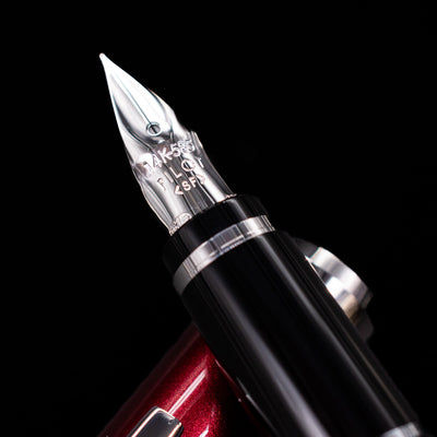 A macro shot of the nib with its intricate detailing and logo engraving for the Pilot Metal Falcon Fountain Pen - Burgundy.