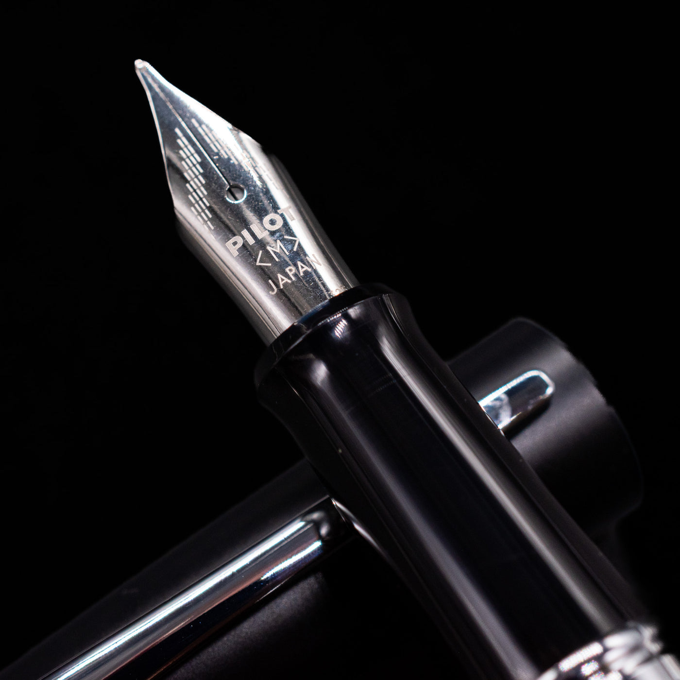  A macro shot of the nib with its intricate detailing and logo engraving for the Pilot Metropolitan Fountain Pen - Plain Black.