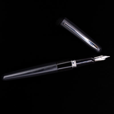 An overhead view of the Pilot Metropolitan Fountain Pen - Plain Black uncaped.