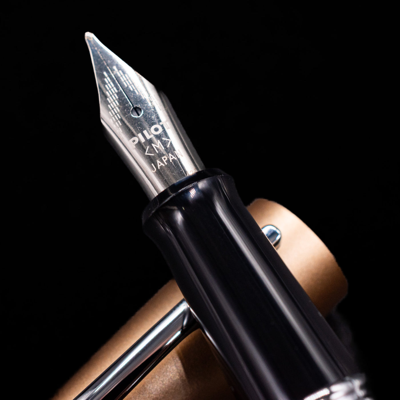  A macro shot of the nib with its intricate detailing and logo engraving for the Pilot Metropolitan Fountain Pen - Plain Gold.